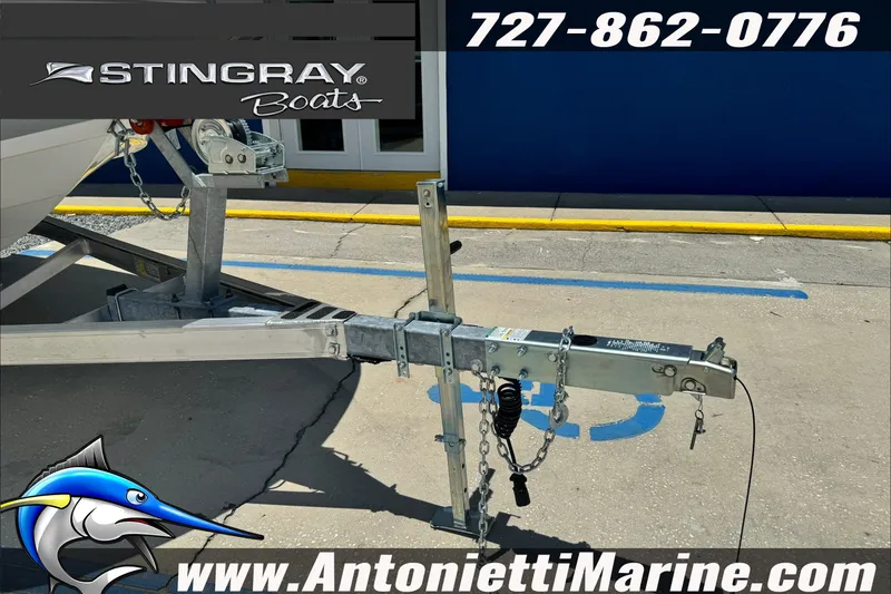 Slide: The Image of Trailer hitch of a 2026 Stingray 206 CC boat at Antonietti Marine. - 6