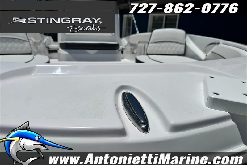 Slide: The Image of 2026 Stingray 206 CC boat with sleek white interior, showcased by Antonietti Marine. - 7