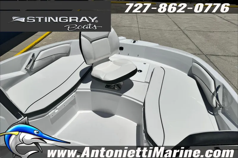 Slide: The Image of 2026 Stingray 206 CC boat interior with white seating, showcased by Antonietti Marine. - 8