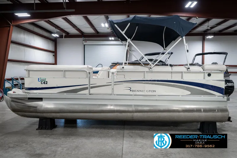 Slide: The Image of 2007 Bennington 2050 GL pontoon boat in indoor storage facility. - 11