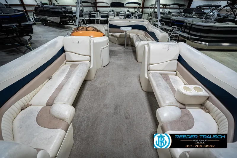 Slide: The Image of Interior of a 2007 Bennington 2050 GL pontoon boat with spacious seating. - 16