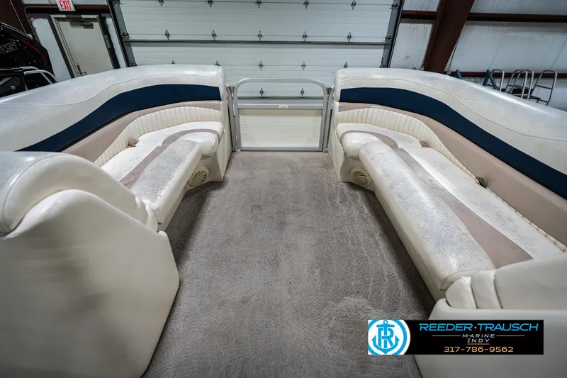 Slide: The Image of Interior of a 2007 Bennington 2050 GL pontoon boat with plush seating. - 22