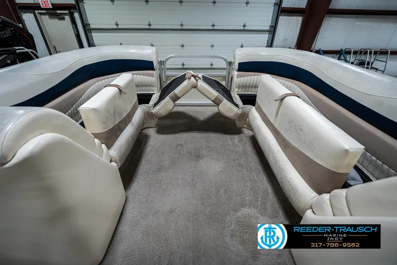 Slide: The Image of Interior of a 2007 Bennington 2050 GL pontoon boat with white seating. - 23