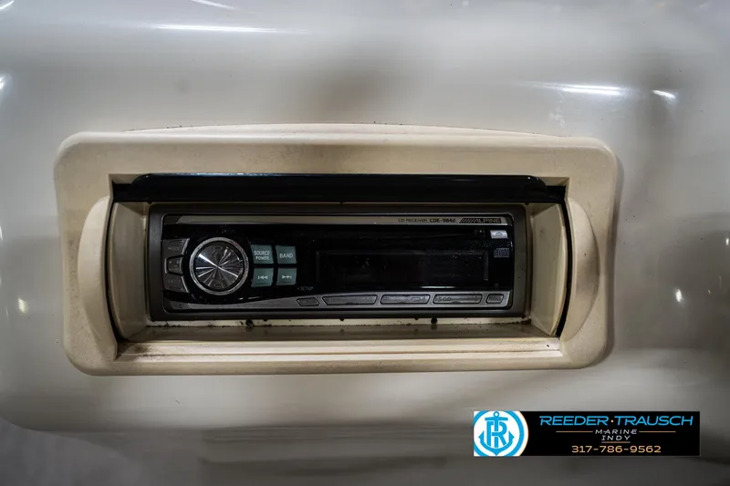 Slide: The Image of Alpine CD receiver in a 2007 Bennington 2050 GL boat dashboard. - 34
