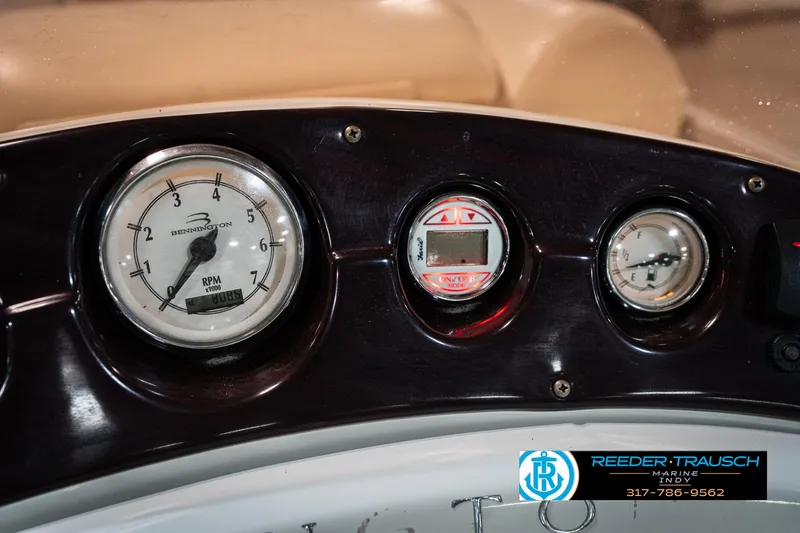 Slide: The Image of Dashboard of a 2007 Bennington 2050 GL boat with gauges and controls. - 36