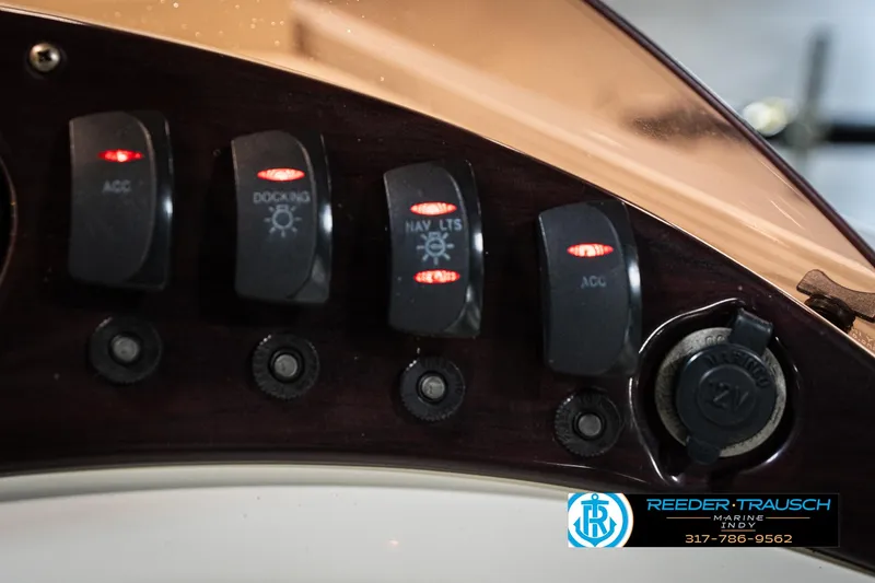 Slide: The Image of Control panel of a 2007 Bennington 2050 GL boat with labeled switches. - 37