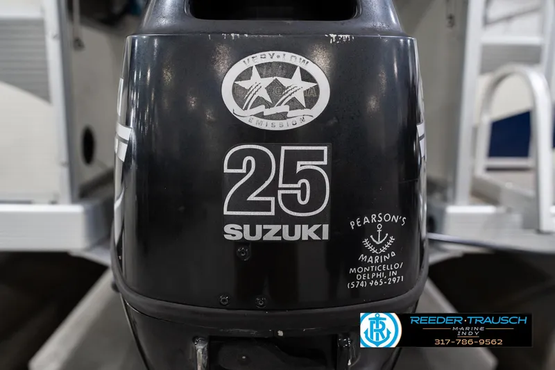 Slide: The Image of Outboard motor on a 2007 Bennington 2050 GL boat, featuring Suzuki branding and Pearson's Marina details. - 46