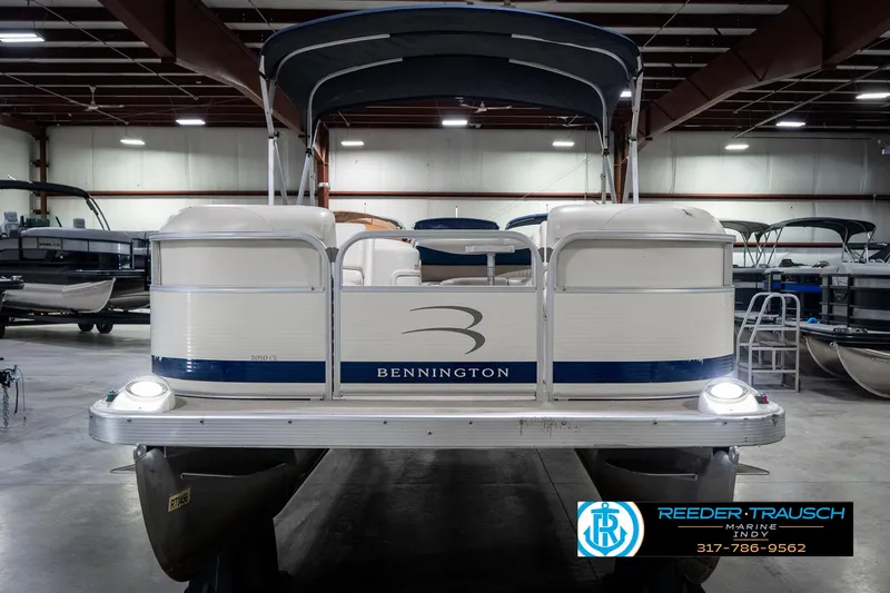 Slide: The Image of 2007 Bennington 2050 GL pontoon boat in indoor showroom, front view. - 5