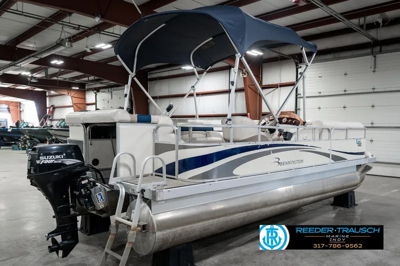 Slide: The Image of 2007 Bennington 2050 GL pontoon boat with Suzuki outboard motor in indoor showroom. - 8
