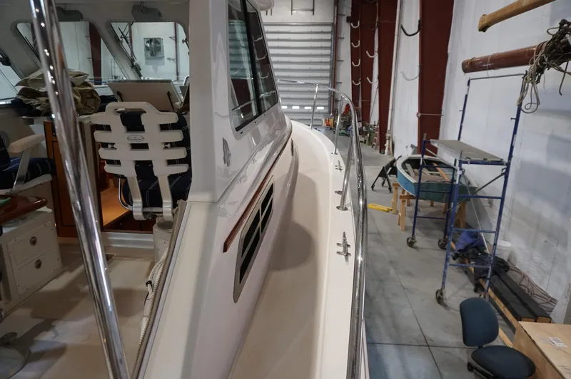 Slide: The Image of 2006 Back Cove 29 boat interior in a workshop setting. - 29
