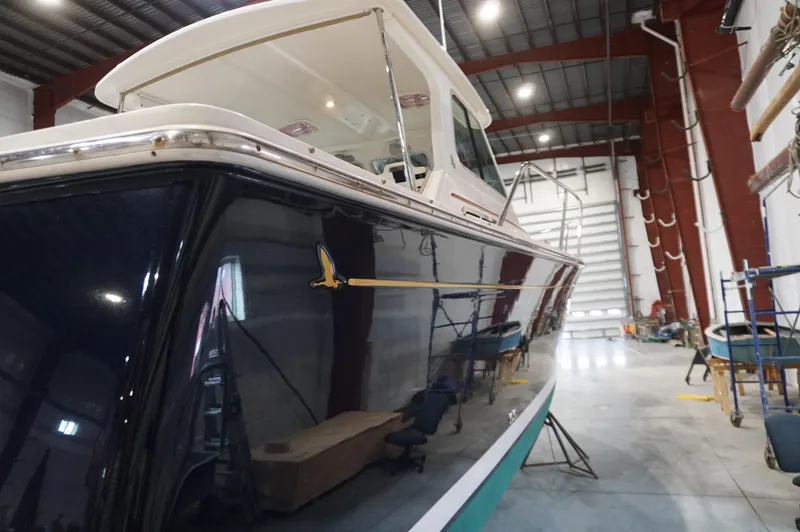 Slide: The Image of 2006 Back Cove 29 boat in a spacious indoor storage facility. - 42