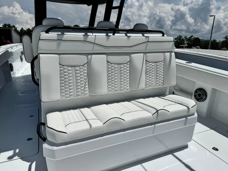 Slide: The Image of Luxurious seating on 2026 Invincible 38 Catamaran, featuring elegant white upholstery. - 12