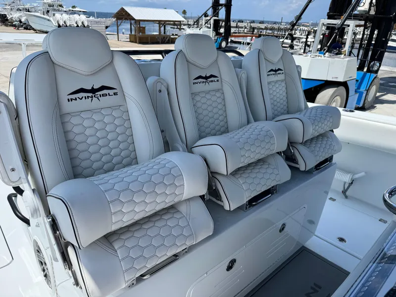 Slide: The Image of Luxury seating on 2026 Invincible 38 Catamaran, featuring sleek design and premium materials. - 21