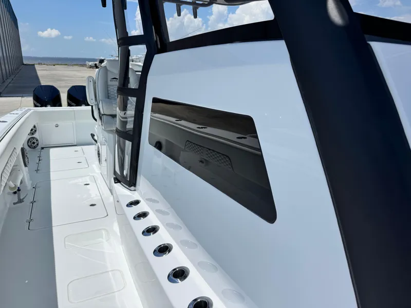 Slide: The Image of 2026 Invincible 38 Catamaran deck with sleek design and modern features. - 33