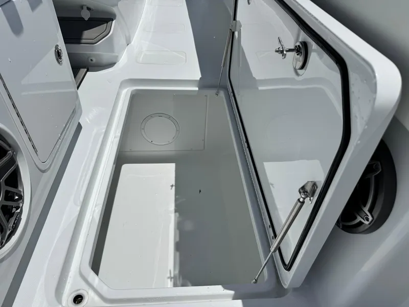 Slide: The Image of Open storage compartment on 2026 Invincible 38 Catamaran boat deck. - 35