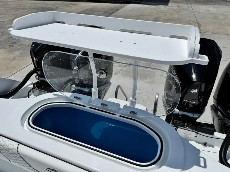 Slide: The Image of 2026 Invincible 38 Catamaran with dual Mercury Verado engines and livewell. - 9