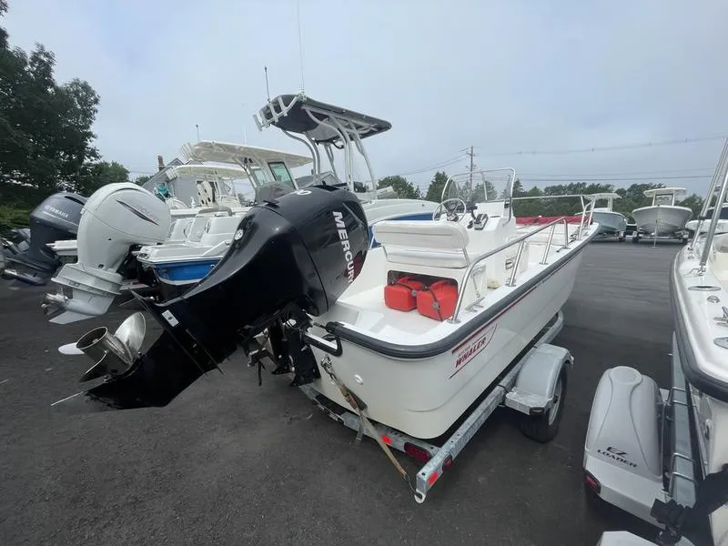 Slide: The Image of 2008 Boston Whaler 170 Montauk boat with Mercury outboard motor on trailer. - 5