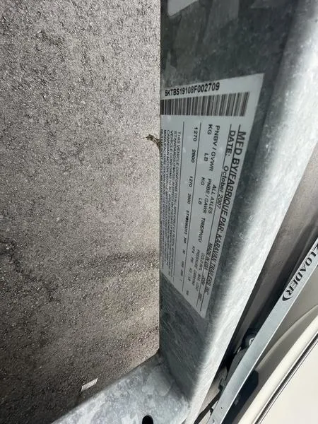 Slide: The Image of Label on 2008 Boston Whaler 170 Montauk boat trailer, displaying specifications and details. - 6