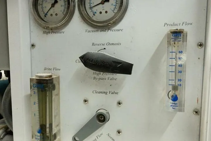 Slide: The Image of Control panel of a 2001 Mikelson 61 Yachtfisher with gauges and flow meters. - 110