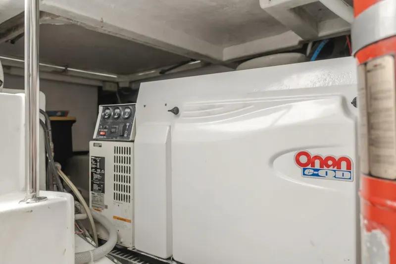 Slide: The Image of Onan generator in the engine room of a 2001 Mikelson 61 Yachtfisher. - 112