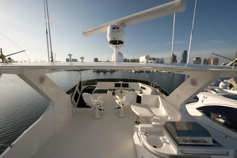 Slide: The Image of 2001 Mikelson 61 Yachtfisher flybridge with city skyline in the background. - 121