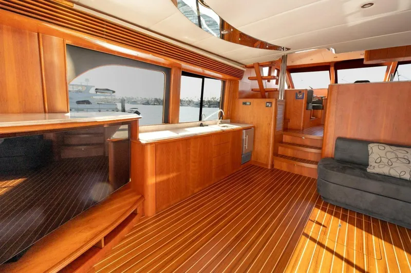 Slide: The Image of Luxurious interior of 2001 Mikelson 61 Yachtfisher with wooden flooring and modern amenities. - 71