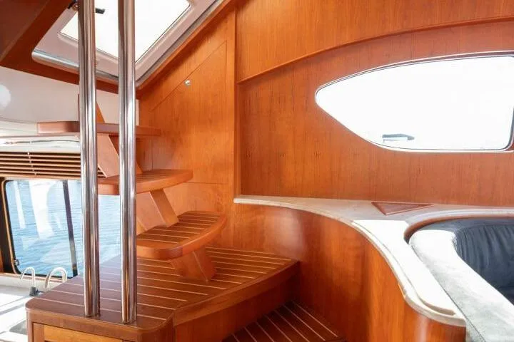 Slide: The Image of Interior of 2001 Mikelson 61 Yachtfisher with wooden staircase and elegant design. - 72
