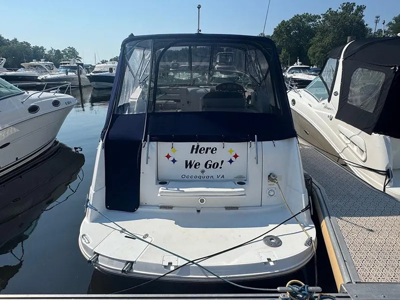 Slide: The Image of 2008 Rinker 280 Express Cruiser docked with "Here We Go!" sign, Occoquan, VA. - 2