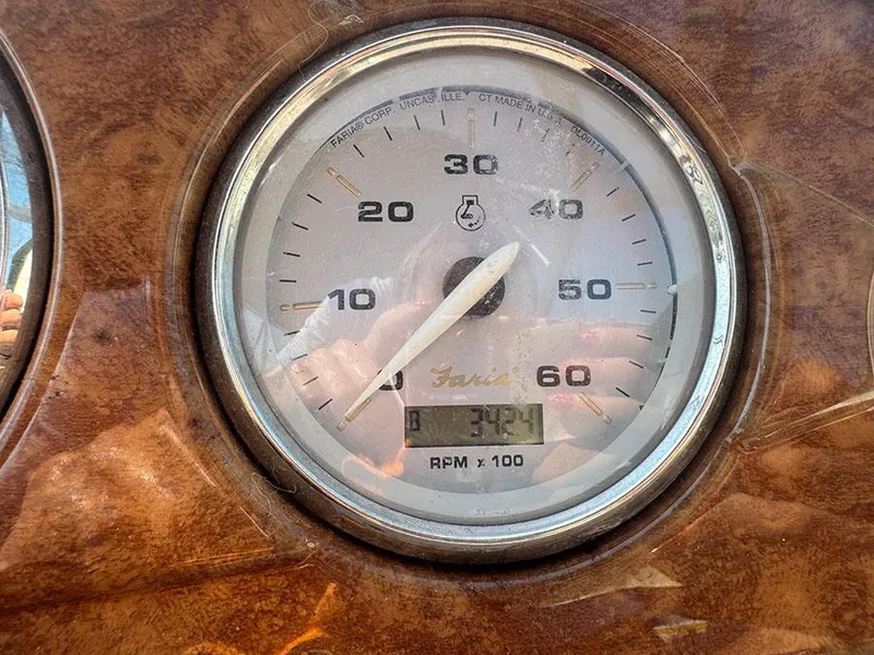 Slide: The Image of Tachometer of 2008 Rinker 280 Express Cruiser showing 3424 RPM. - 20
