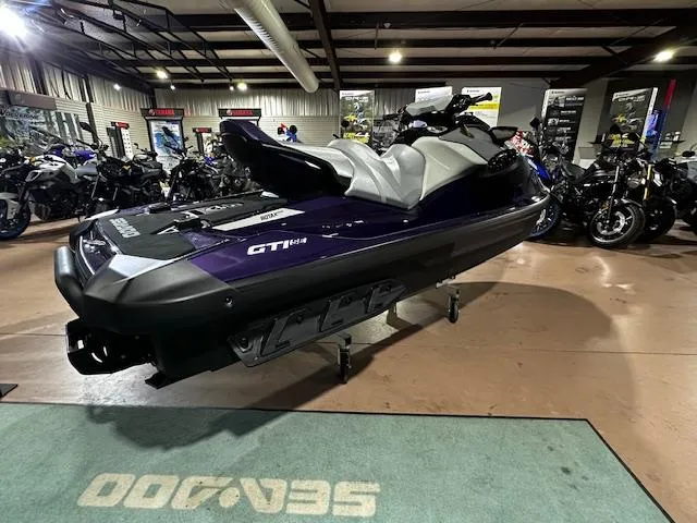 Slide: The Image of 2025 Sea-Doo GTI SE 130 with Audio on display in showroom. - 12