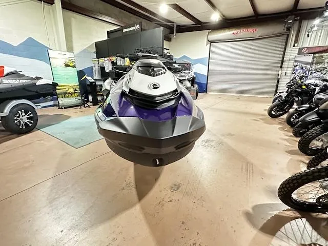 Slide: The Image of 2025 Sea-Doo GTI SE 130 with Audio in showroom, surrounded by motorcycles. - 4