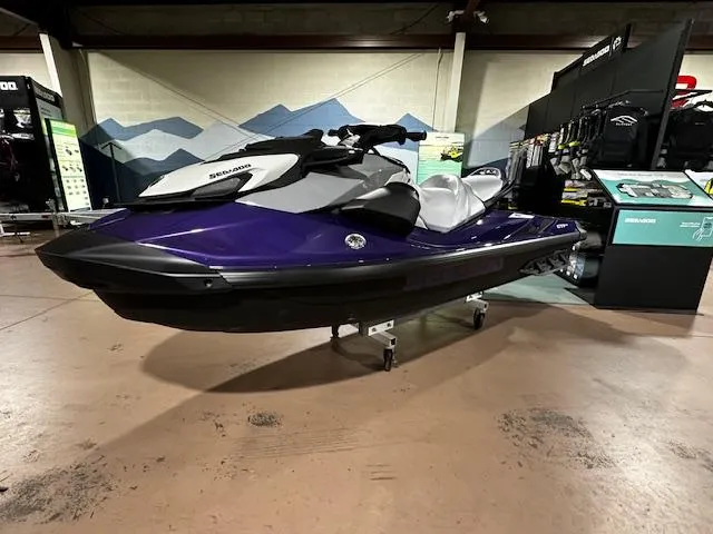 Slide: The Image of 2025 Sea-Doo GTI SE 130 W/ Audio, purple, displayed indoors. - 6