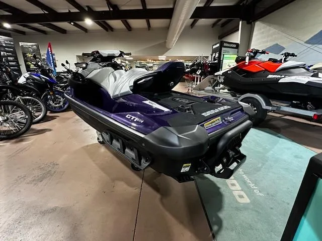 Slide: The Image of 2025 Sea-Doo GTI SE 130 W/ Audio jet ski displayed in showroom. - 9