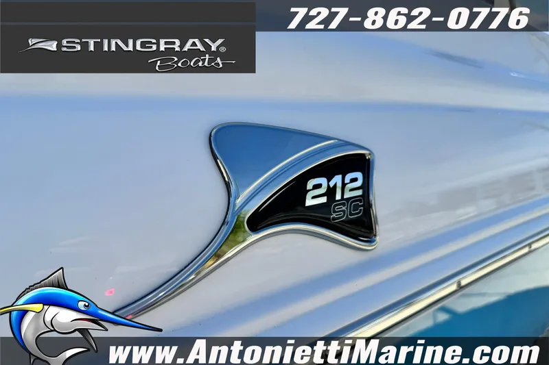 Slide: The Image of 2026 Stingray 212 SC boat emblem with contact and website details. - 12