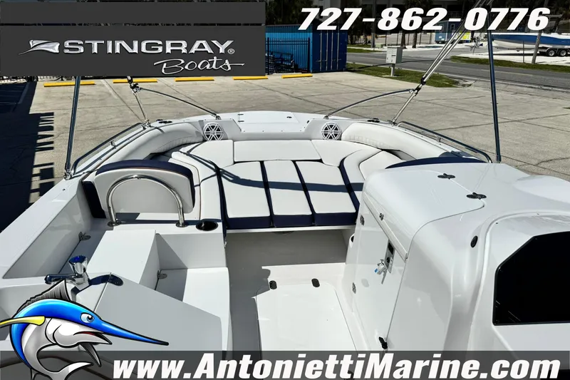 Slide: The Image of 2026 Stingray 212 SC boat interior with seating, displayed at Antonietti Marine. - 13