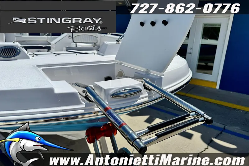 Slide: The Image of 2026 Stingray 212 SC boat with swim ladder, showcased at Antonietti Marine. - 16