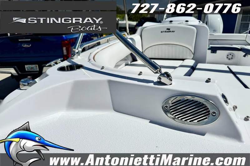 Slide: The Image of 2026 Stingray 212 SC boat interior with seating and speaker, Antonietti Marine branding. - 18