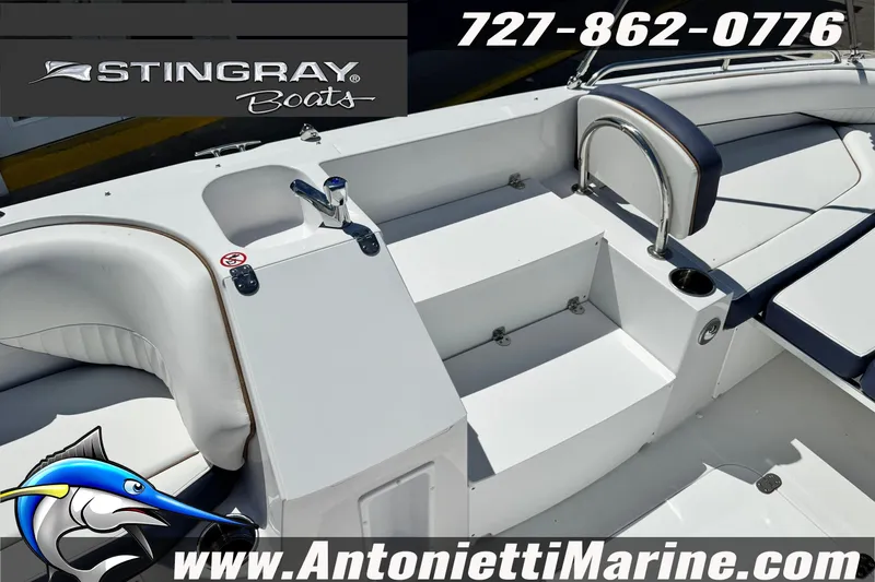 Slide: The Image of 2026 Stingray 212 SC boat interior with seating and sink, Antonietti Marine branding. - 23