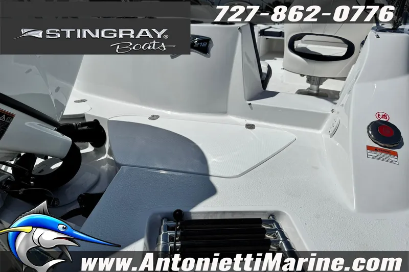 Slide: The Image of 2026 Stingray 212 SC boat interior with seating, showcased by Antonietti Marine. - 8