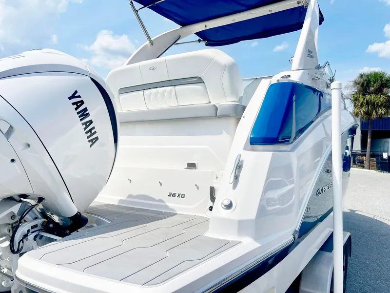 Slide: The Image of 2024 Regal 26XO boat with Yamaha engine, featuring sleek design and modern amenities. - 4