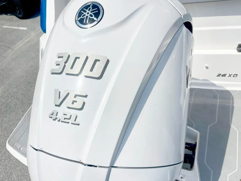 Slide: The Image of 2024 Regal 26XO boat with Yamaha 300 V6 4.2L outboard engine. - 9
