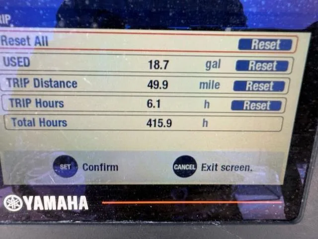 Slide: The Image of Yamaha display showing trip data: 18.7 gallons used, 49.9 miles, 6.1 hours, 415.9 total hours. - 16