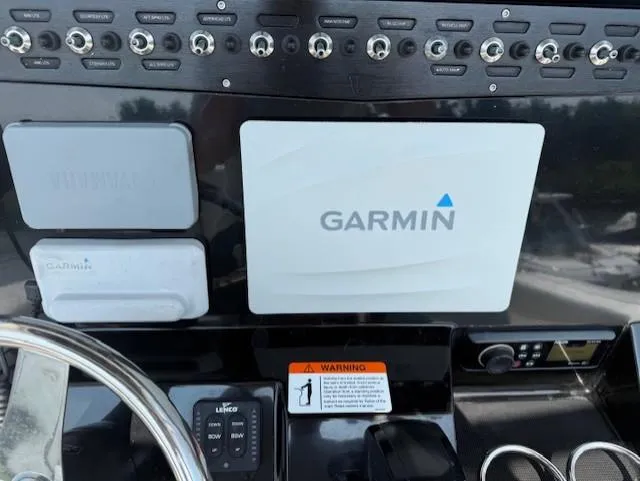 Slide: The Image of Control panel of 2018 Wellcraft 222 Fisherman boat with Garmin navigation system. - 5