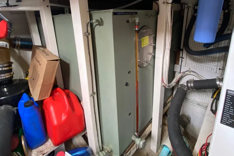 Slide: The Image of Engine room of 1980 Grand Banks 42 Europa with fuel tanks and equipment. - 21