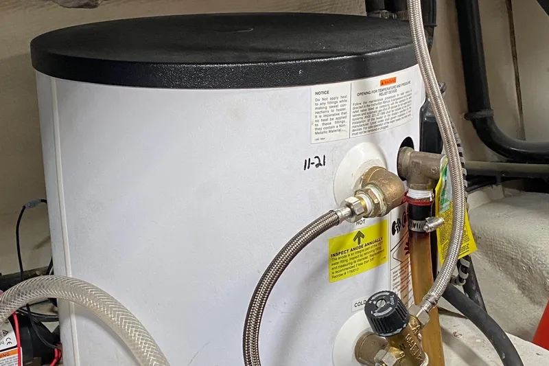 Slide: The Image of Water heater in a 1980 Grand Banks 42 Europa boat engine room. - 23