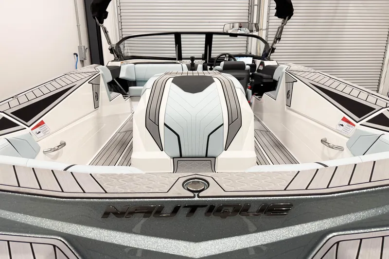 Slide: The Image of 2025 Nautique Ski Nautique boat interior with sleek design and modern features. - 9