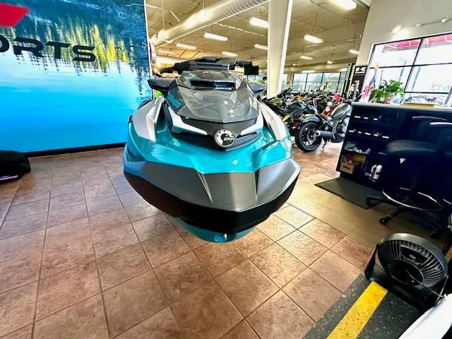 Slide: The Image of 2025 Sea-Doo GTX Limited 325 jet ski displayed in a showroom. - 4
