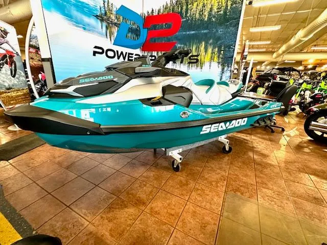 Slide: The Image of 2025 Sea-Doo GTX Limited 325 jet ski displayed in showroom. - 6