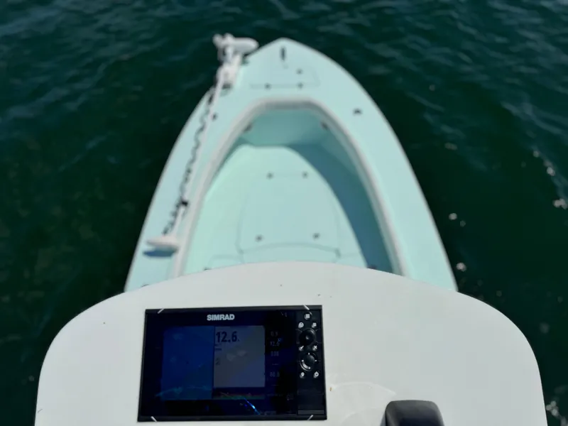 Slide: The Image of 2020 Sabalo 27 boat with Simrad display on calm water. - 15
