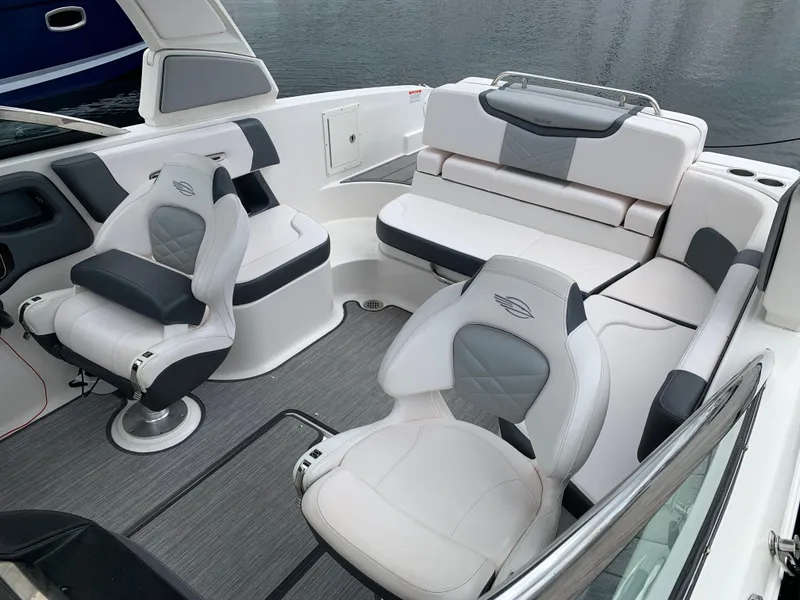 Slide: The Image of 2021 Chaparral 267 SSX boat interior with luxurious seating and modern design. - 26